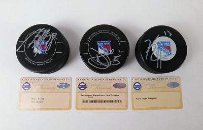 Lot of 3 New York Rangers Autographed Hockey Pucks. Including Kevin Hayes, Dan Girardi, and 