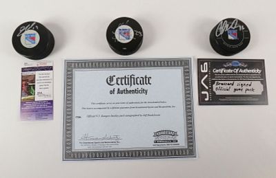 Lot of 3 New York Rangers Autographed Hockey Pucks. Including Jeff Beukeboom with Grandstand 