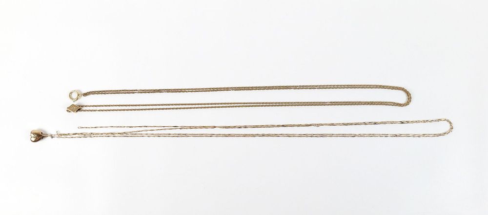 Lot 243: Pair of 19th Century Gold Filled Slide Chains