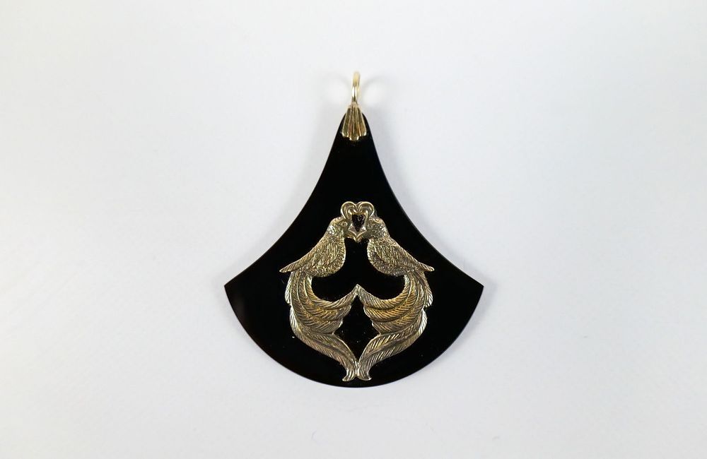 Lot 244: Vintage Onyx and 14K Pendant