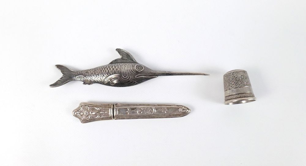 Lot 310: 19th Century Sterling Thimble, Needle Case, and Awl