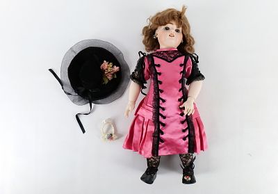 Antique Porcelain Doll. Composition Body. Some crazing throughout. Some molding present on her