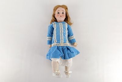 Antique Porcelain Doll. Composition Jointed Body. Head Marked Germany. Measures 23.5" long. All