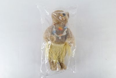Steiff Hawaiian Girl Mohair Bear. Dated 1998. Measures 16" long. Comes with tag and ear tag.