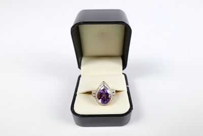 14K Gold, Diamond and Amethyst Ring. The lot includes a 14K yellow/white gold ring with a large 