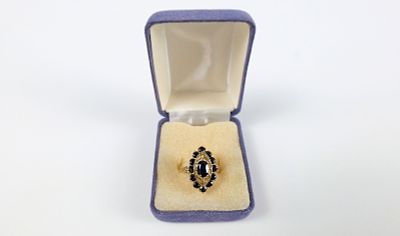 10K Gold and Sapphire Navette Ring. The lot includes a 10K yellow gold navette style ring 