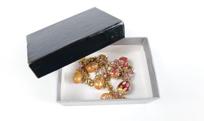 Joan Rivers Gold Tone and Enamel Egg Charm Necklace. The lot includes an adjustable gold tone 
