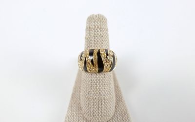 Gold Tone Tiger Stripe Ring by Swarovski. The lot includes a sz 8 gold tone domed band ring by 