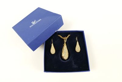 Tear Drop Necklace and Earrings Set by Swarovski. The lot includes a gold tone tear drop 