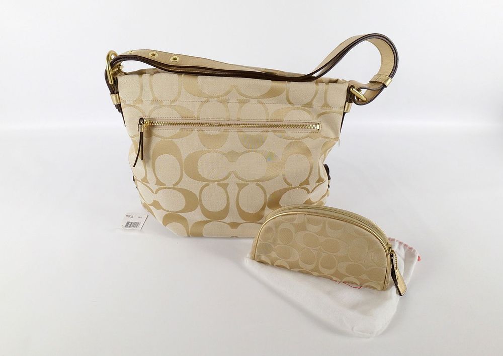 Lot 171: Coach Pocket Book and Cosmetic Case Lot
