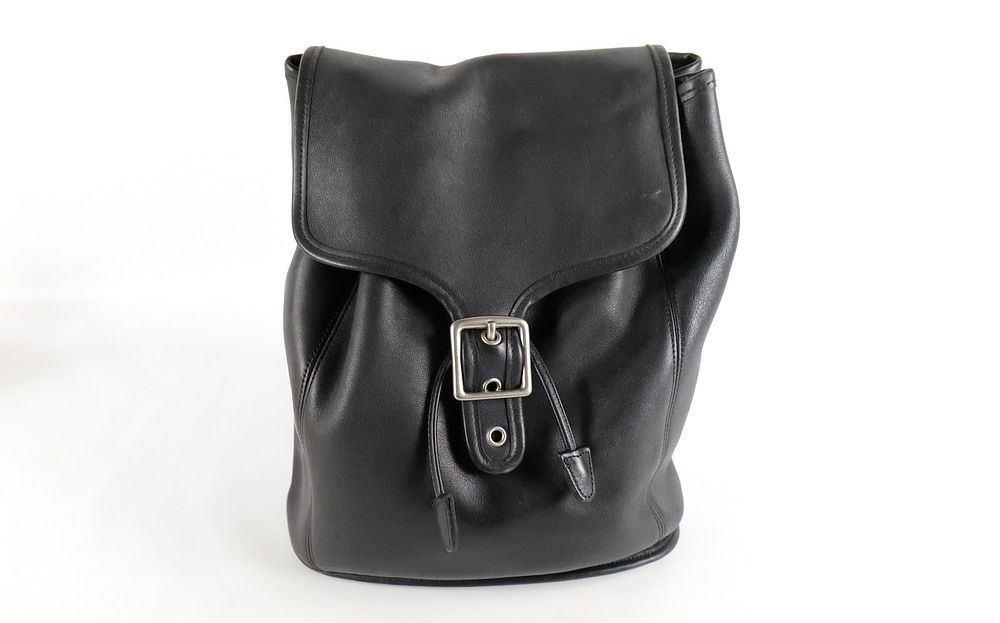 Lot 176: Coach Black Leather Drawstring Backpack