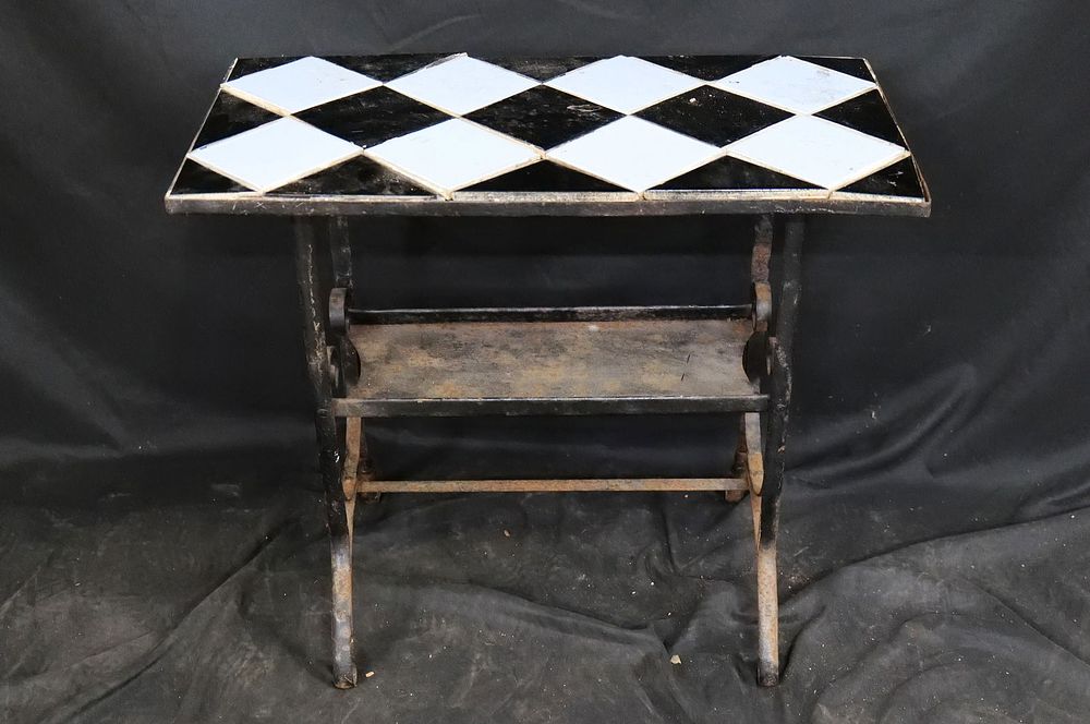 Lot 359: Title Topped Iron Side Table