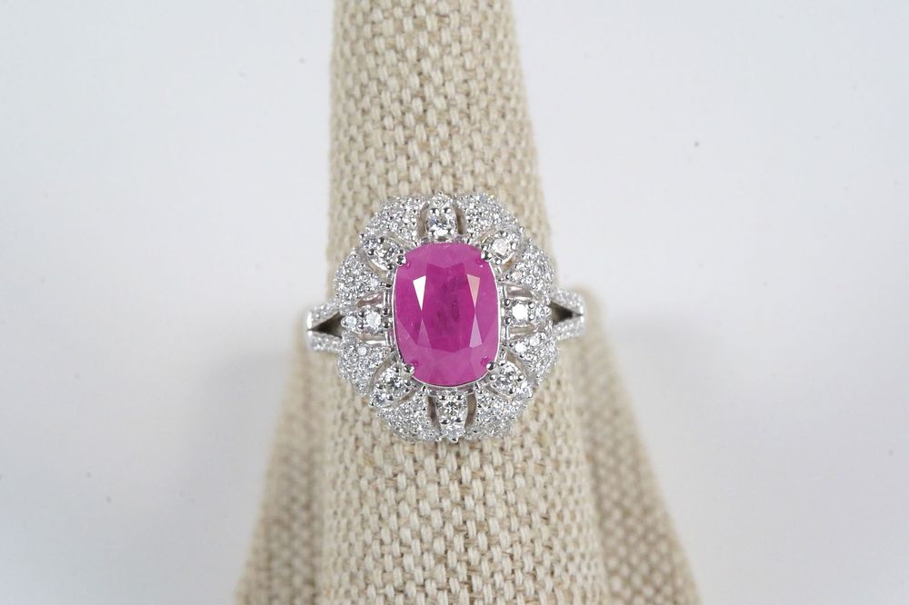 Lot 381: Karl Haas Platinum Sapphire and Diamond Ring
