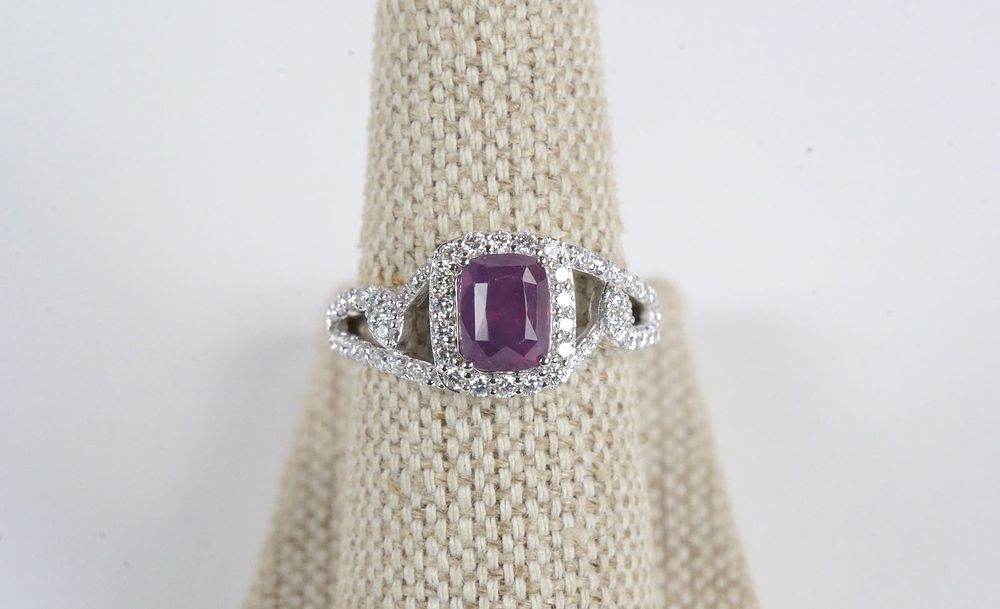 Lot 383: Platinum Sapphire and Diamond Ring