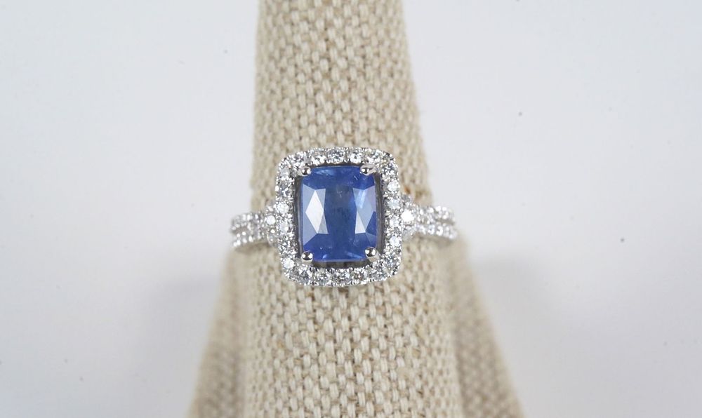 Lot 385: Platinum Diamond and Blue Sapphire Ring