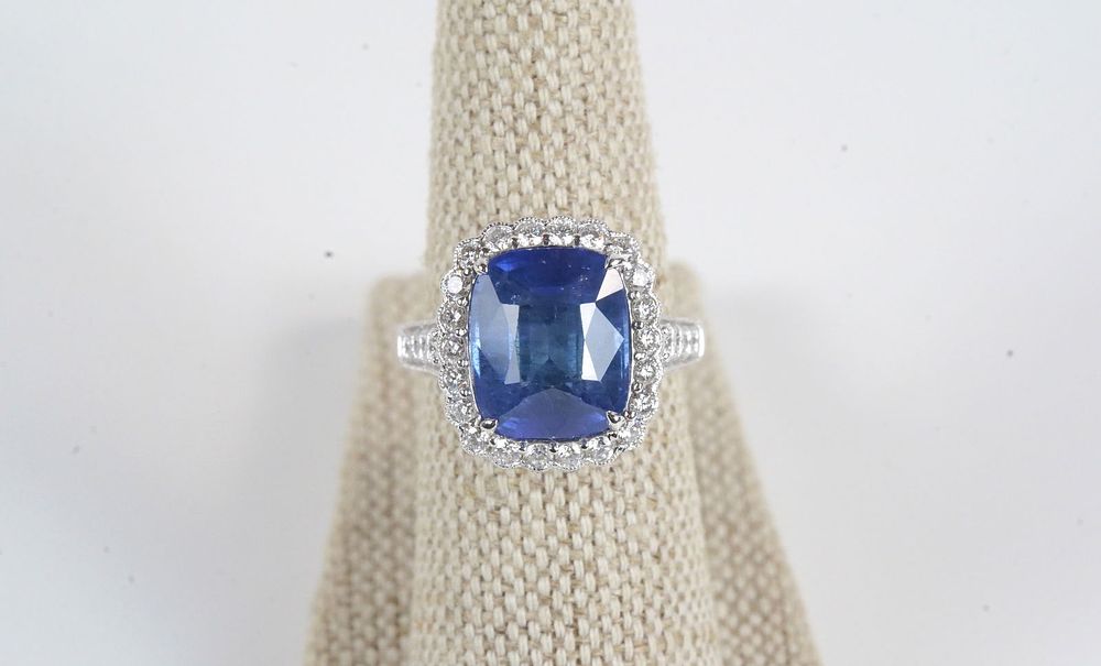 Lot 386: Platinum Blue Sapphire and Diamond Ring