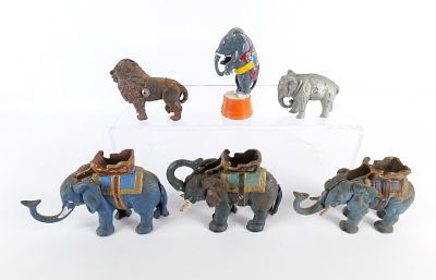 Lot of 6 Vintage Reproduction Cast Iron Animal Banks. Including Elephants and a Lion. Tallest 