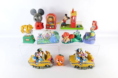 Lot of Disney Plastic Banks. Including 2 Fab Five Taxi Cabs, Cinderella Coach, Simba Gumball 