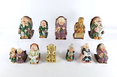 Lot of Ceramic Old People in Rockers Banks. Some say Retirement Fund. Tallest bank has chips 