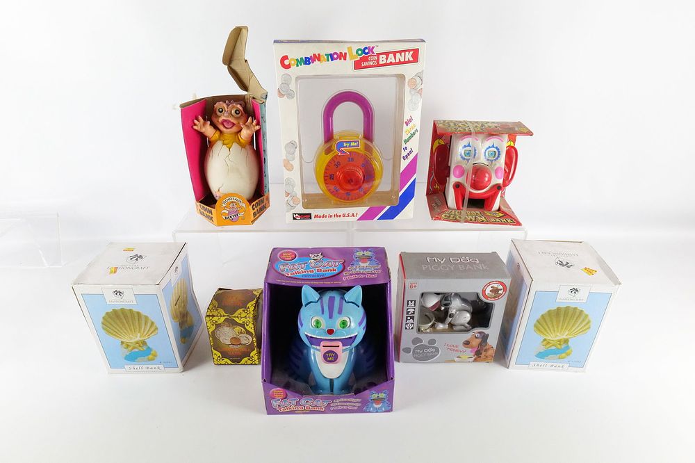 Lot 159: Lot of 8 Novelty Banks - In Original Boxes