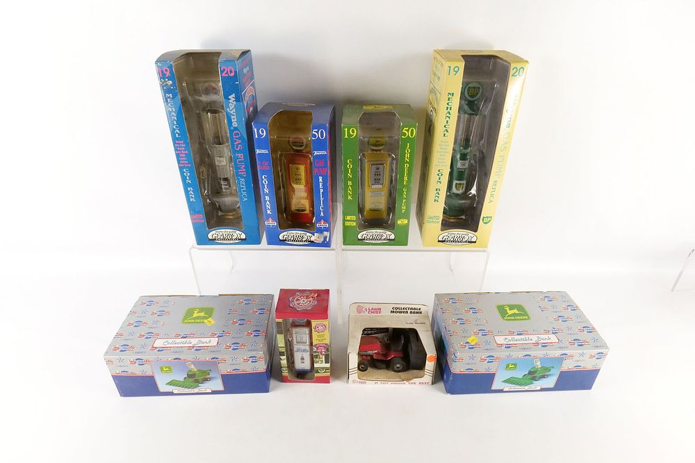 Lot 205: Group Lot of Gas Pumps and Farm Vehicle Novelty Banks