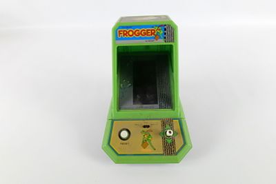 Vintage Frogger by Sega Mini Arcade Game. Decals have wear. Stickers on back. Battery cover 