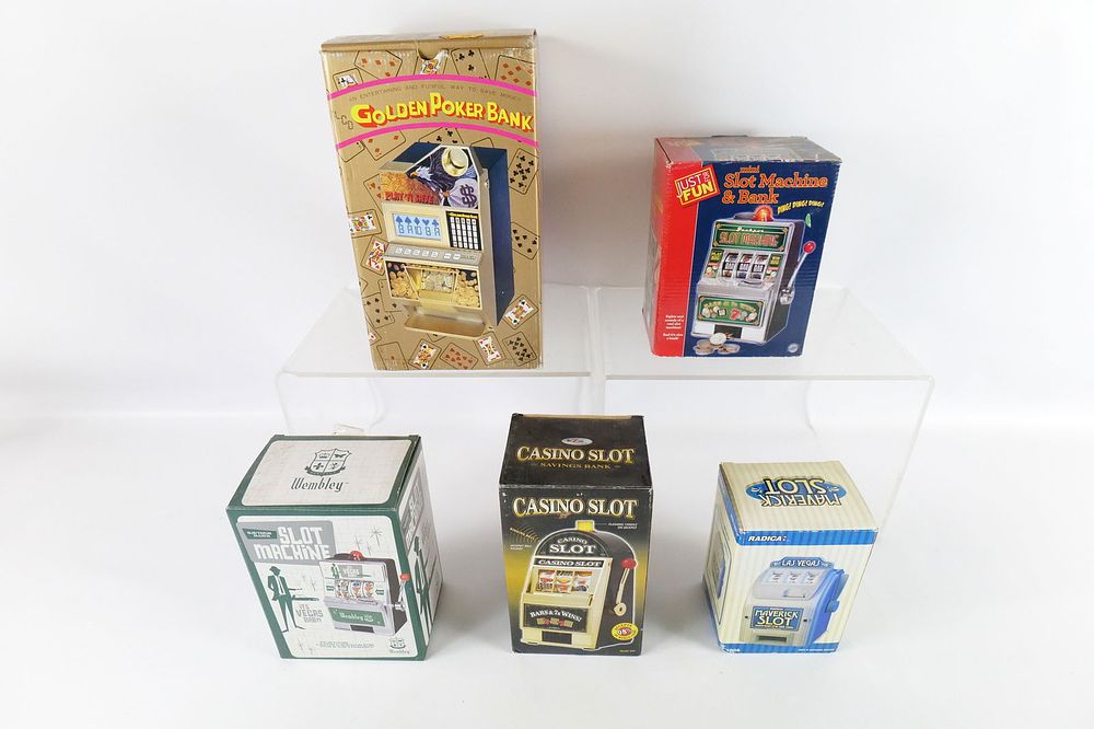 Lot 222: Group Lot of Novelty Slot Machine Banks in Original Boxes