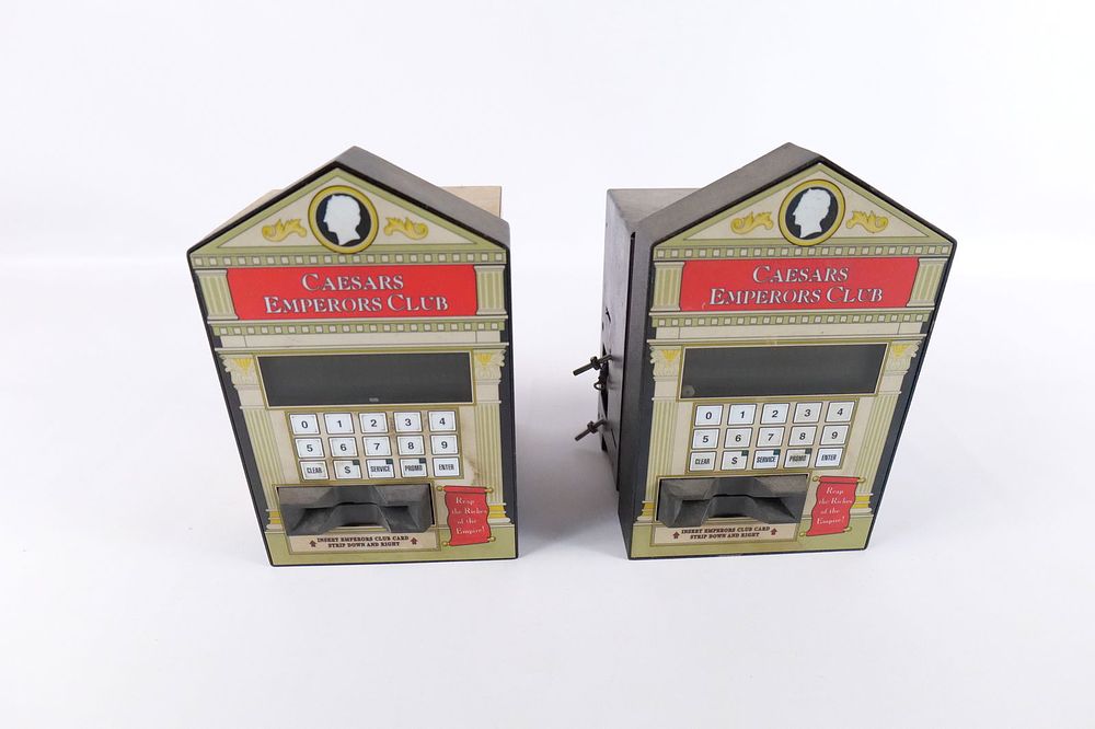 Lot 225: Lot of 2 Caesars Emperors Club Slot Machine Money Boxes