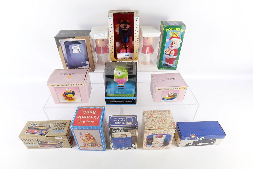 Lot 232: Lot of Novelty Banks in Original Packaging