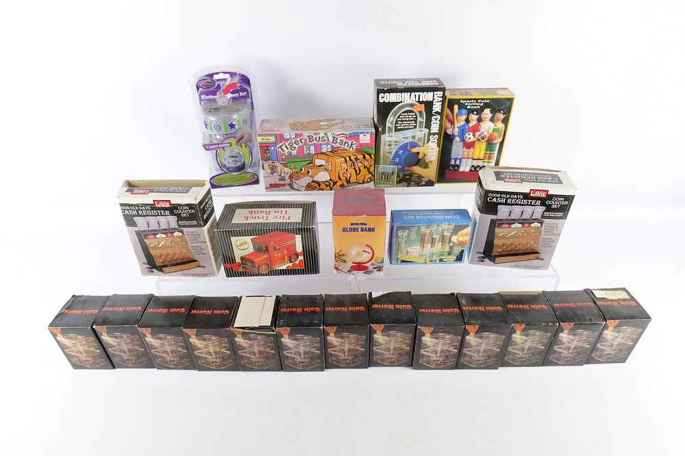 Lot 236: Group Lot of Coin Sorters and Banks in Original Boxes