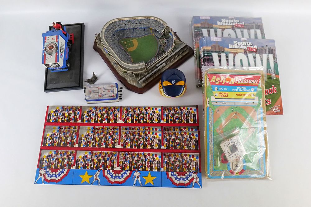Lot 262: Group Lot of Sports Related Collectibles