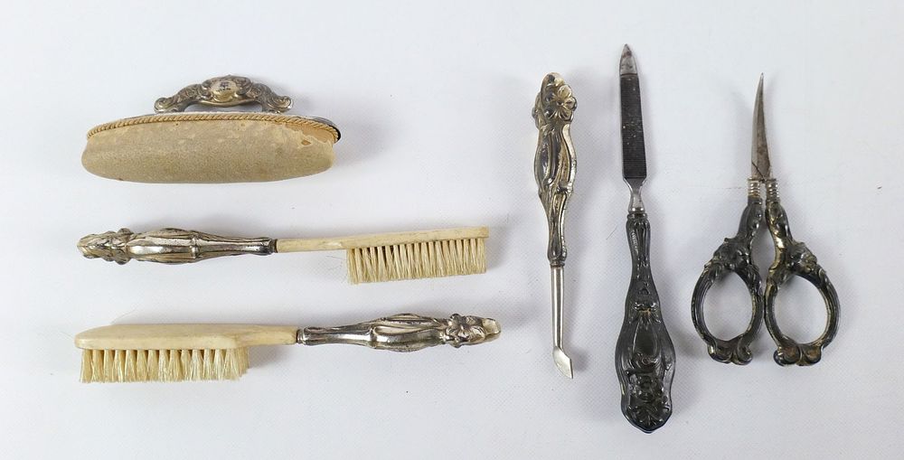 Lot 202: Lot of Antique Sterling Silver Handled Vanity Items