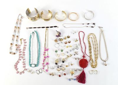 Lot of Assorted Costume Jewelry. Including Brass Cuff Bracelets, Carved Wooden Asian Pendant 