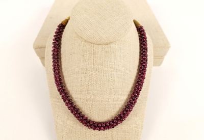 Adjustable Ruby Necklace. Adjustable Necklace with Small Rubies Braided into Rope. Necklace is 