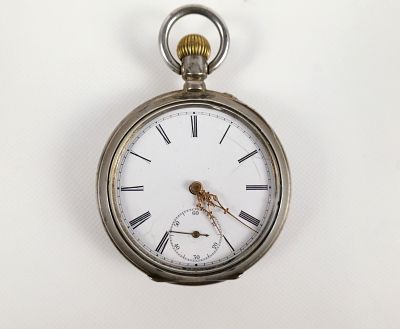 800 Silver Pocket Watch - Unmarked. Has hallmarks inside. Measures 1 7/8" across. All invoices 