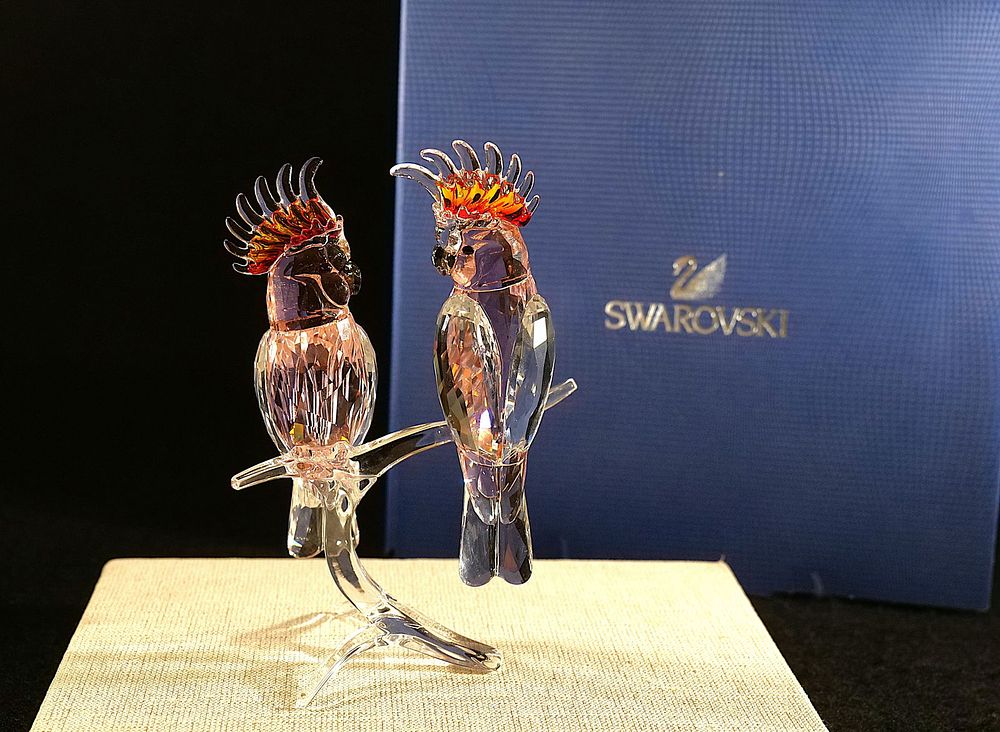Lot 190: Swarovski Paradise Collection Pink Cockatoo Pair