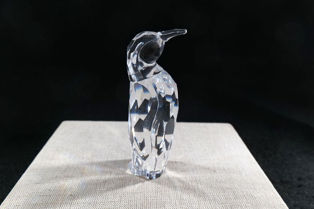 Lot 202: Swarovski Crystal Penguin Father Figurine