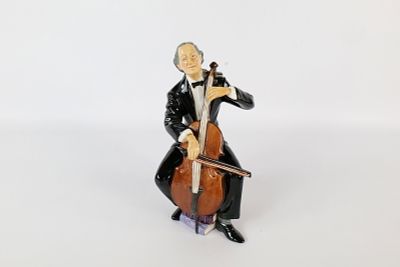 Royal Doulton The Cellist Figurine - HN 2226. Measures 8.5" tall. All invoices must be paid 