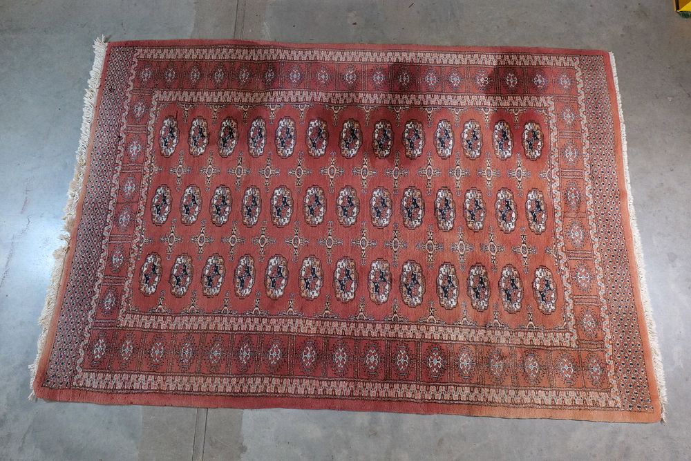 Lot 240: Vintage Hand-Knotted Pakistani Bokhara Wool Rug - Rust/Terra Cotta