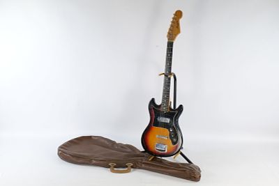 Vintage 1970's Harmony H801 Electric Guitar. Sunburst finish body with Maple Neck. Has a 6 