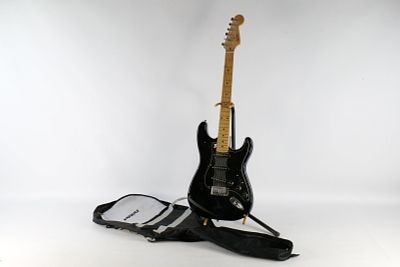 Vintage 1998 Squier by Fender Stratocaster with Gig Bag. Serial Number: CY98091832 - Crafted in 