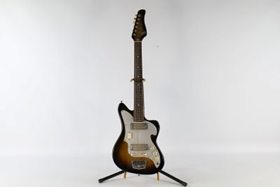 Vintage 1960's Zen-On MIJ Solid Body Electric Guitar. Three tone Sunburst during the Bizarre 