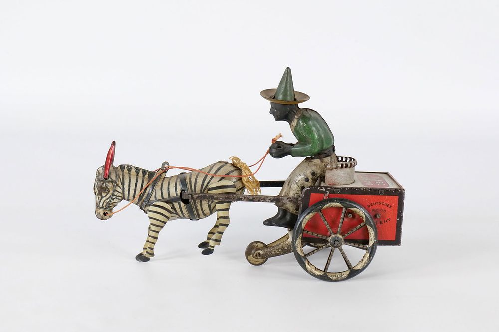 Lot 203: Lehmann Tin Wind-Up Daredevil Zebra Cart