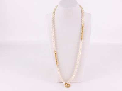14k Yellow Gold and Pearl Necklace. Has sections of rope link chain in between sections of 7.3 