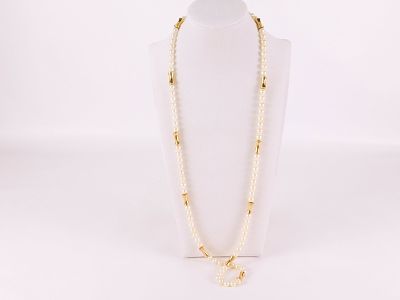 14k & Pearl Necklace. 14k &amp; Pearl Necklace. Has 11 Elongated 14k beads in between 6.8 mm 