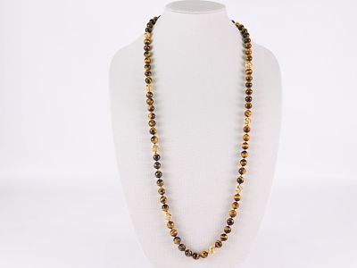 14k & Tiger's Eye Necklace. 14k &amp; Tiger's Eye Necklace. It has a 14k yellow gold clasp and 9 