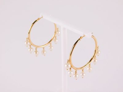 Pair of 14k Hoop Earrings with 7 Pearl Drops. Pearls measure 5 mm. Earrings measure 1 1/2". All 
