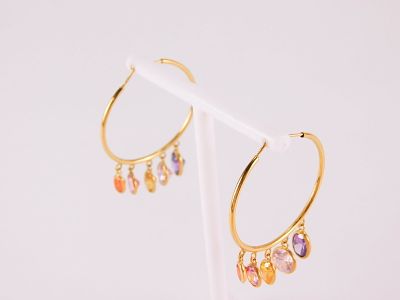 Pair of 14k Hoop Earrings with Graduated Oval Shaped Gemstones. The gemstones range in size 