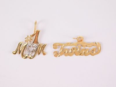 Lot of 2 14k Yellow Gold Pins and Pendants. Including Twins measuring 1/2" tall and #1 Mom with 