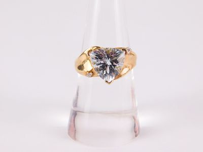 14k Yellow Gold, Aquamarine and Diamond Ring. The band is a gradient size with a faceted 